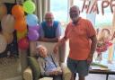 Vera Briggs celebrating her 100th birthday with her sons Geoff and Graham at Pendle Brook Care Home