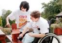 CARING Jasmine joined CSV, whose volunteers are seen helping disabled people