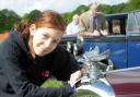 Kayleigh Sheridan admires a Riley Sports car