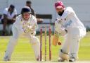 Ribblesdale Wanderers wicketkeeper Andrew Needham focused as Farnworth's Yatin Mangwani blocks a delivery Picture: Harry McGuire