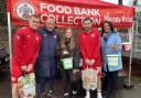 Jimmy Bell and ASFC players donating at the foodbank collection for Maundy Relief