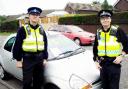 ALERT PCSO Ian Pickles and PC Mick Jones are among police keeping an eye on rogue traders who sell cars at the roadside