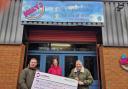 Cllr Steven Smithson, Lorraine Hargreaves and Cllr Peter Britcliffe with the cheque