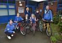 (Adults) L – Michelle Grimes, Project Lead at Active Cycles, C – Dr Amanda Thornton, Active Lancashire Board Lead for Health and Wellbeing, R – Mr Clough, Sports Coach at Brunshaw Primary School with students and their donated bikes from Active