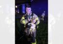 Firefighter Archer gave oxygen to the rescued dog