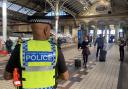 A police officer was kicked in the face during an incident at Preston railway station
