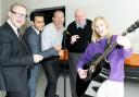 Rhia Adams, 18, fronts her “band”, from left, Blackburn with Darwen Council’s Andrew Lightfoot, Aemen Ali of the Youth Zone, chairman Andrew Graham and chief exec Peter Little