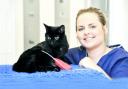 Veterinary nurse Sarah Cairns with Susie the cat