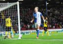 Jordan Rhodes is a player to celebrate but times have not always been easy for Rovers fans