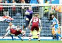 Rovers goalkeeper Paul Robinson comes and claims a cross during the East Lancashire derbvy