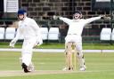 Burnley wicketkeeper Chris Burton can’t hide his delight after Kristian Garland was trapped lbw by Bharat Tripathi