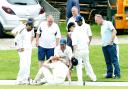 Todmorden’s Kristian Garland is attended to after colliding with the boundary