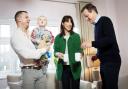 VISIT: Prime minister David Cameron and his wife Samantha about to have a cuppa with first-time buyer Robert Arron and son Finlay at the Heritage Brook housing development in Chorley