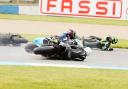 CRASH: Tom Carne, far right, narrowly missed this pile up during the National Superstock race Picture: JOHN MANCLARK