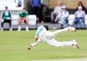 FULL STRETCH: Colne professional Thomas Kaber dives for a return ball after bowling					            Pictures: KIPAX