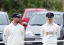 BAND OF BROTHERS: David Brown (left) chats to brother Michael in the outfield during Sunday’s Worsley Cup semi-final win over Lowerhouse