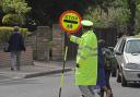 Meeting arranged after speeding car nearly hits lollipop man on notorious road