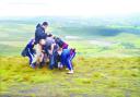 SCRUM UP: The boys play on Pendle Hill