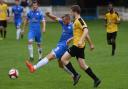 Ramsbottom United's Kyle Brownhill in action in the win over Prescot Cables