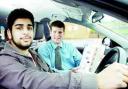 LEARNING CURVE: Bilal Hussain, 17, with driving instructor Steve Rhodes