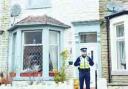 POLICE PRESENCE: An officer outside the property in Willow Street raided by police