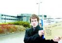 REBUFFED: Lancashire Telegraph reporter Ben Briggs at Post Office headquarters with the petition opposing closures