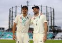 Alastair Cook and Jimmy Anderson celebrate the 4-1 series win over India