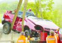 SCENE: Mr Moore’s Citroen Saxo is lifted on to a recovery truck,