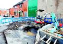 ‘LIKE A FOUNTAIN’: The huge hole which appeared in Lime Street, Blackburn, after a water pipe burst