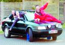 HOMAGE TO CATALONIA: From left, Lee Harrison, Alban Horrocks and Paul Blackburn with their Audi ‘banger’