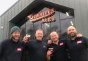 Thwaites brewing team toast their success with pints of 13 Guns beer