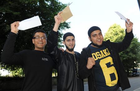 Pupils at Blackburn College show off their results