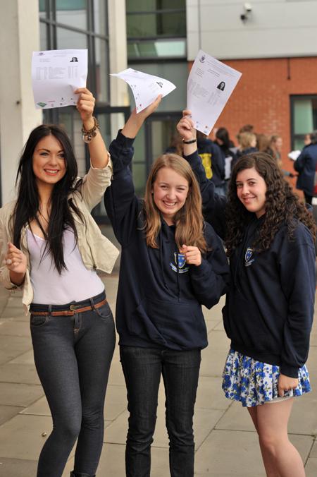 Students from St Wilfrid's, Blackburn celebrate receiving their GCSE grades.