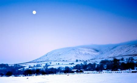 By John Lenehan, of Tockholes, 'The moon rising over Pendle Hill, with the wintry dusk casting a blue sheen over the scene.'
