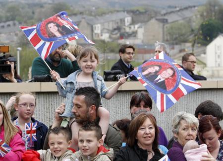 Crowds in Darwen await the arrival of prince William and Kate Middleton.