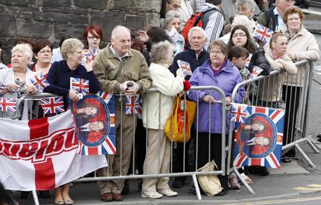 Crowds in Darwen await the arrival of prince William and Kate Middleton.