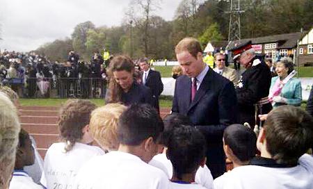 Prince William and Kate Middleton meetin waiting fans at Witton Park.