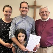 Rt Rev. Julian Henderson and Rev. Sam Cheesman, with Sam’s wife Mairi Cheesman and daughter Lydia as Sam receives his license to become the new Bishop’s Chaplain during Evening Prayer recently at Bishop’s House.