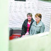 CELLS TOUR: Jackie Mohammadian, left, and Louise Long, both from Wilpshire, look around the court cells