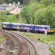 The first train on the Todmorden Curve en route between Burnley and Manchester Victoria on May 17 2015