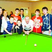 FAN BASE: Steve with the youngsters who enjoyed the snooker scheme at Whalley Village Hall