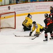 James Neil (right) scoring against 
Sutton Sting last weekend