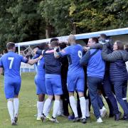 Clitheroe celebrate their late, late winner against Ossett United. Picture: Frank Crook
