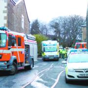 SCENE: Emergency crews during the 5-hour siege in Emily Street, Burnley