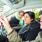 TEACHING THE MUMS: Driving instructor Peter Starkie with Sarfraz Siddiq (left) and Zarina Hassan