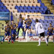 Stanley's Joe Pritchard (left) scores his side's first goal in the 2-2 draw at Shrewsbury