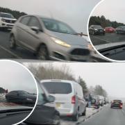 Cars parked bumper to bumper on the Grane Road