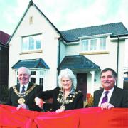 LAUNCH: Coun Don Parkinson, Mayor of South Ribble, Coun Iris Smith, Mayor of Chorley, and Tony Stevens, md of Redrow Homes (Lancashire), cut the ribbon