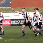 Connor Hall celebrates opening the scoring for Chorley against Derby