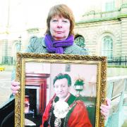 PUBLIC APPEAL: Eileen Hall with her father’s portrait